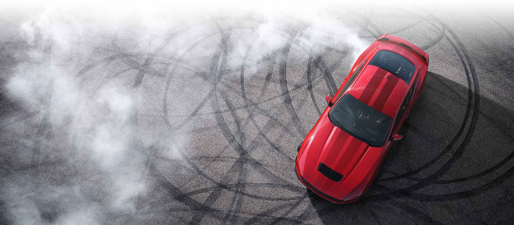 Overhead view of a 2024 Ford Mustang® model with tire tracks on pavement | Donley Ford of Mt. Vernon, Inc in Mount Vernon OH